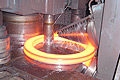 Wagner Radial-Axial Ring Rolling Equipment - Comprised of Rotating King Roll, Mandrel, and Axial Cones